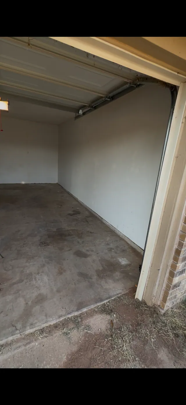 Empty garage after Blackland completed the cleanout