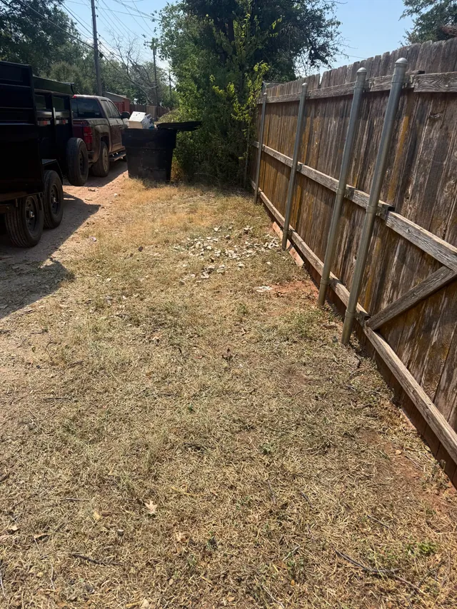 Cleared fence line after Blackland removed the debris